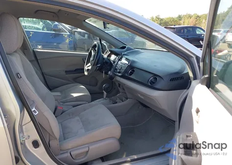 2011 Honda Insight Ex z USA, uszkodzony, nr VIN JHMZE2H7XBS002401